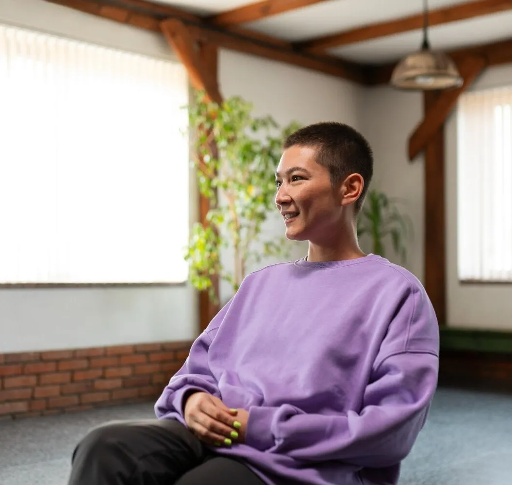 woman in purple sweater
